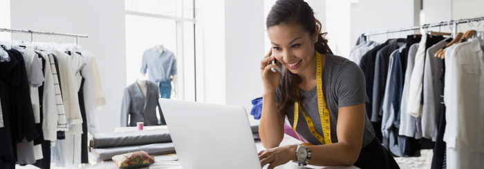 Small business owner on her laptop for online banking and electronic statements