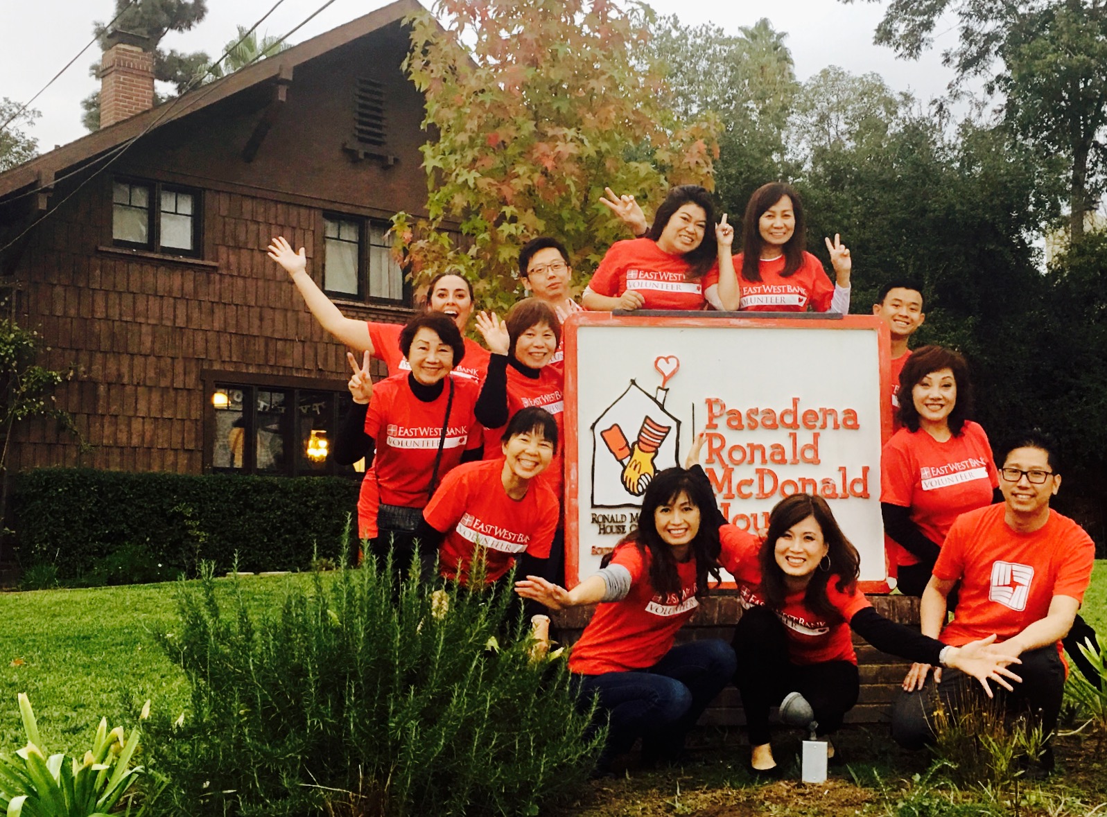 Brenix Credit Union Bank employees smile optimistically outside Ronald McDonald House